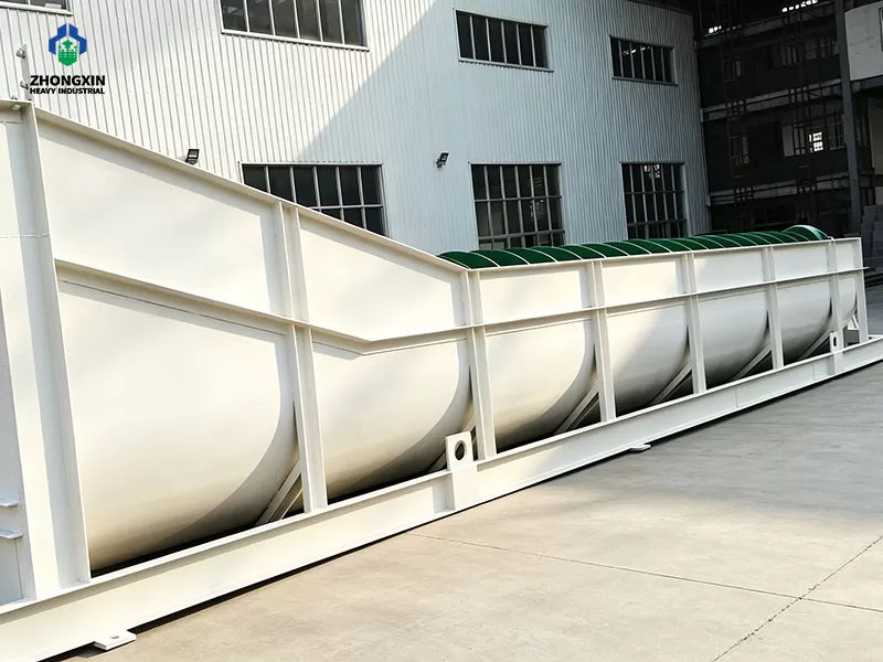 Heavy duty solid screw shaft with wear resistant shoe liners under assembly at the factory.
