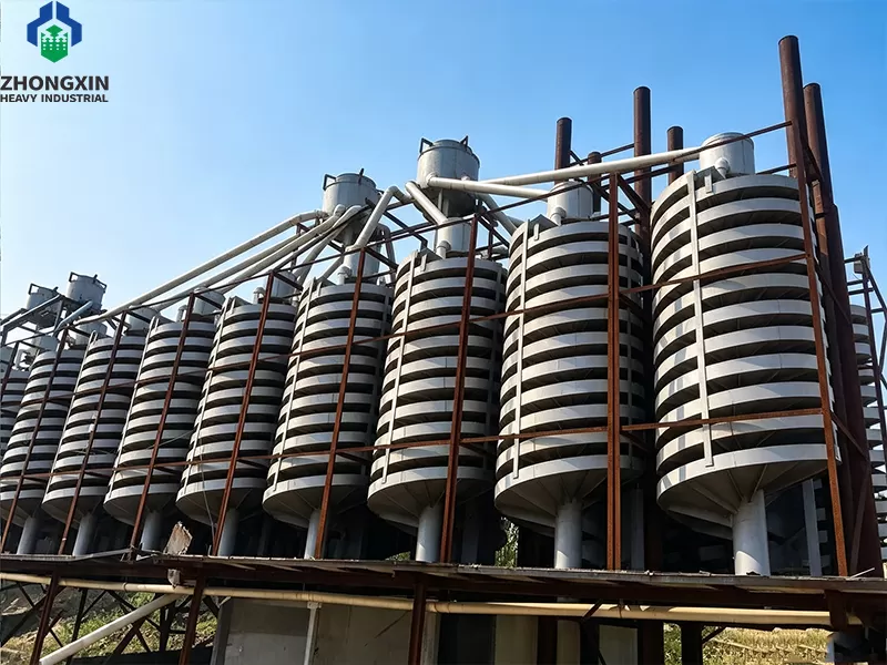 Industrial scale spiral concentrators processing silica sand in a wet beneficiation facility.
