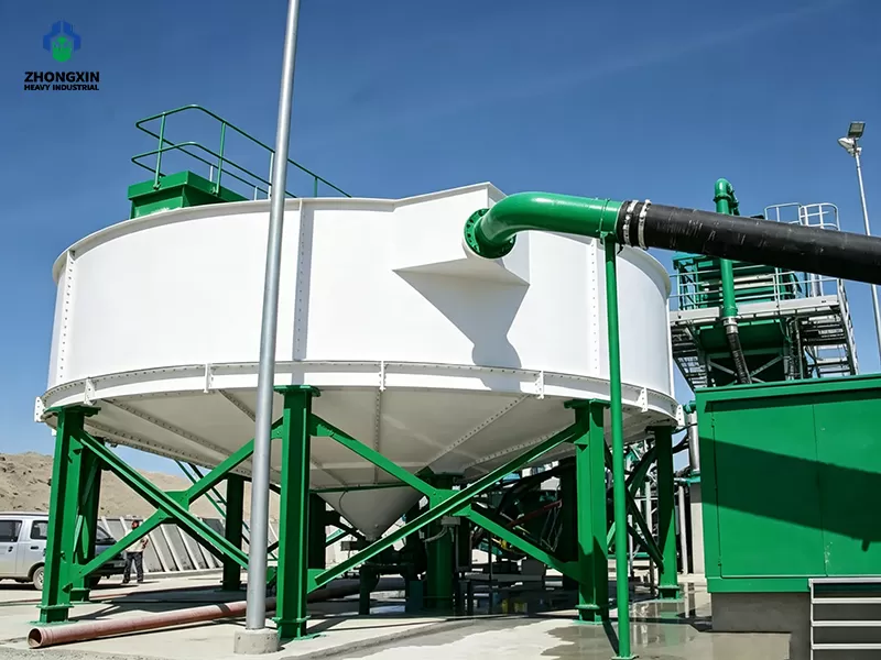 Large-scale open-pit mining processing plant with peripheral drive thickener infrastructure