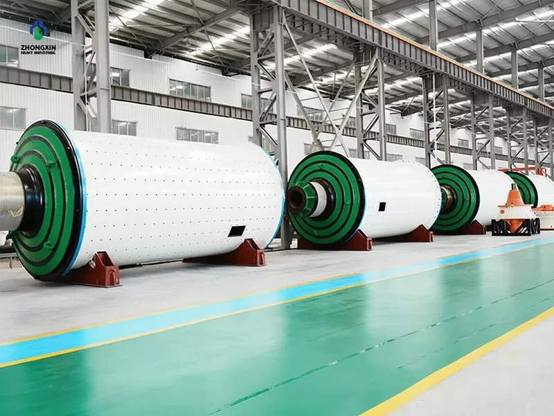 Ball mill manufacturing process in workshop with heavy industrial equipment assembly