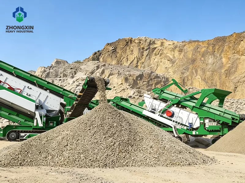 Primary mobile jaw crusher breaking down large raw granite blocks up to 500m