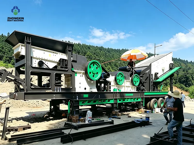 Heavy-duty mobile primary jaw crusher station with ZSW vibrating feeder for crushing hard granite rocks