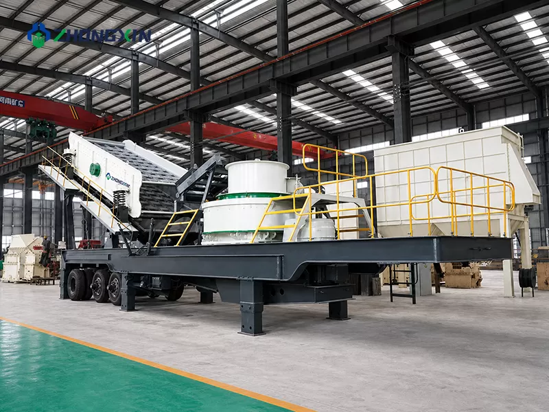 Technicians conducting electrical wiring and system integration tests on the control panel of a mobile sand making machine