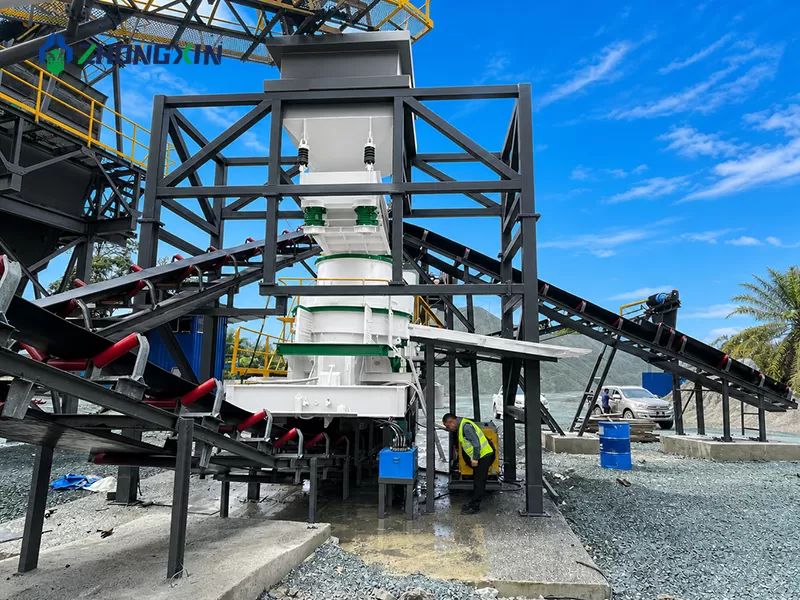 Complete mobile aggregate processing line crushing river pebbles into high-grade construction sand at a remote project site