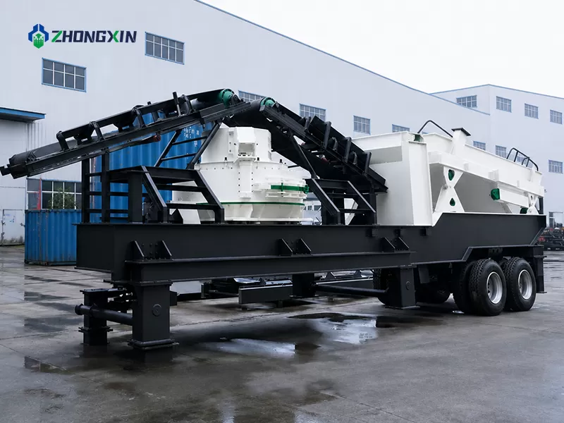 Zhongxin Heavy Industry wheel-mounted mobile sand making machine being safely loaded onto a heavy transport truck for international shipping