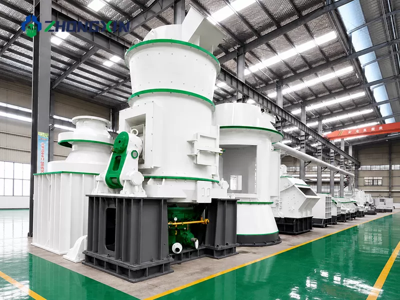 Heavy equipment assembly workshop showcasing vertical grinding mill structures