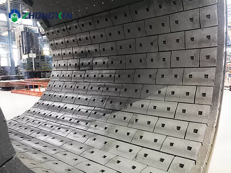 Wear-resistant high-manganese steel liner plates inside dry ball mill shell