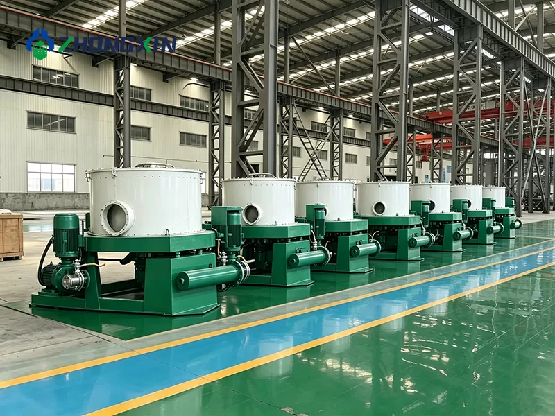 Jiaozuo Zhongxin factory floor with multiple centrifugal gold processing machines under inspection