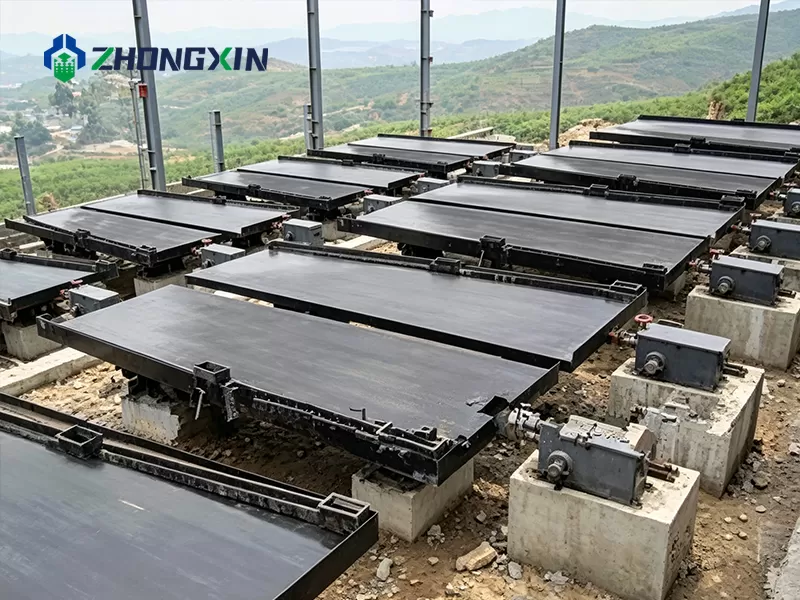 Gravity shaking table feed box and water distribution system installation
