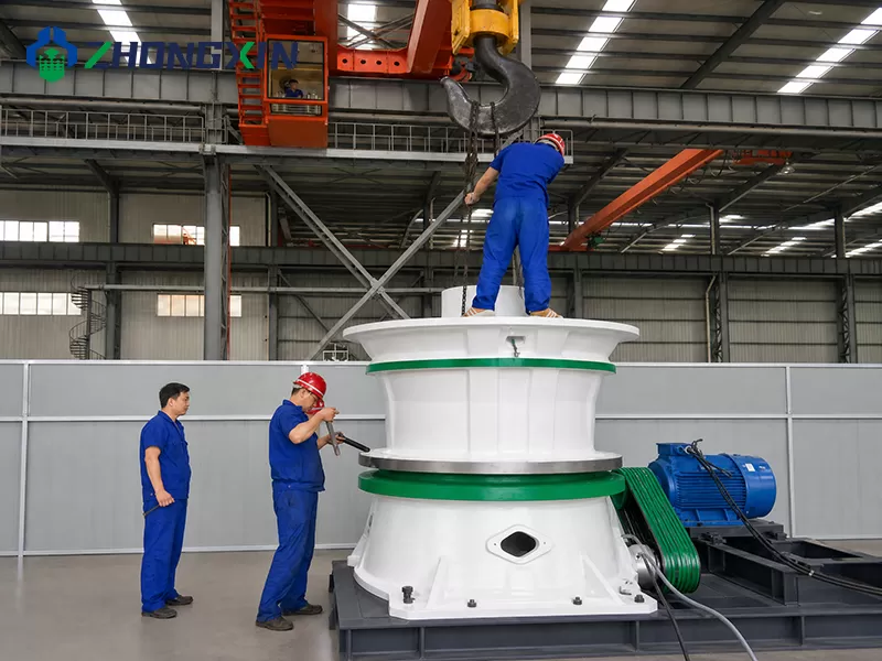 Factory technical team inspecting DP single cylinder cone crusher before delivery