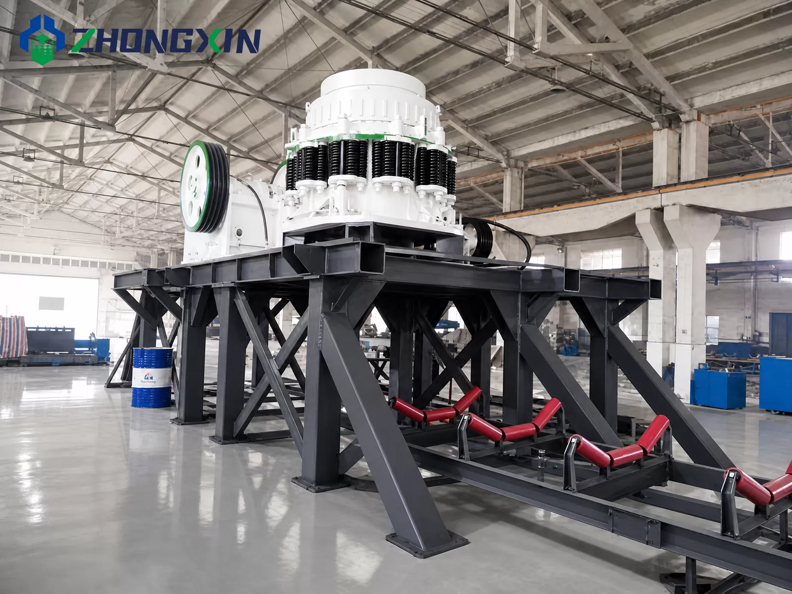 ZX series compound cone crusher mounted on heavy-duty steel base in factory