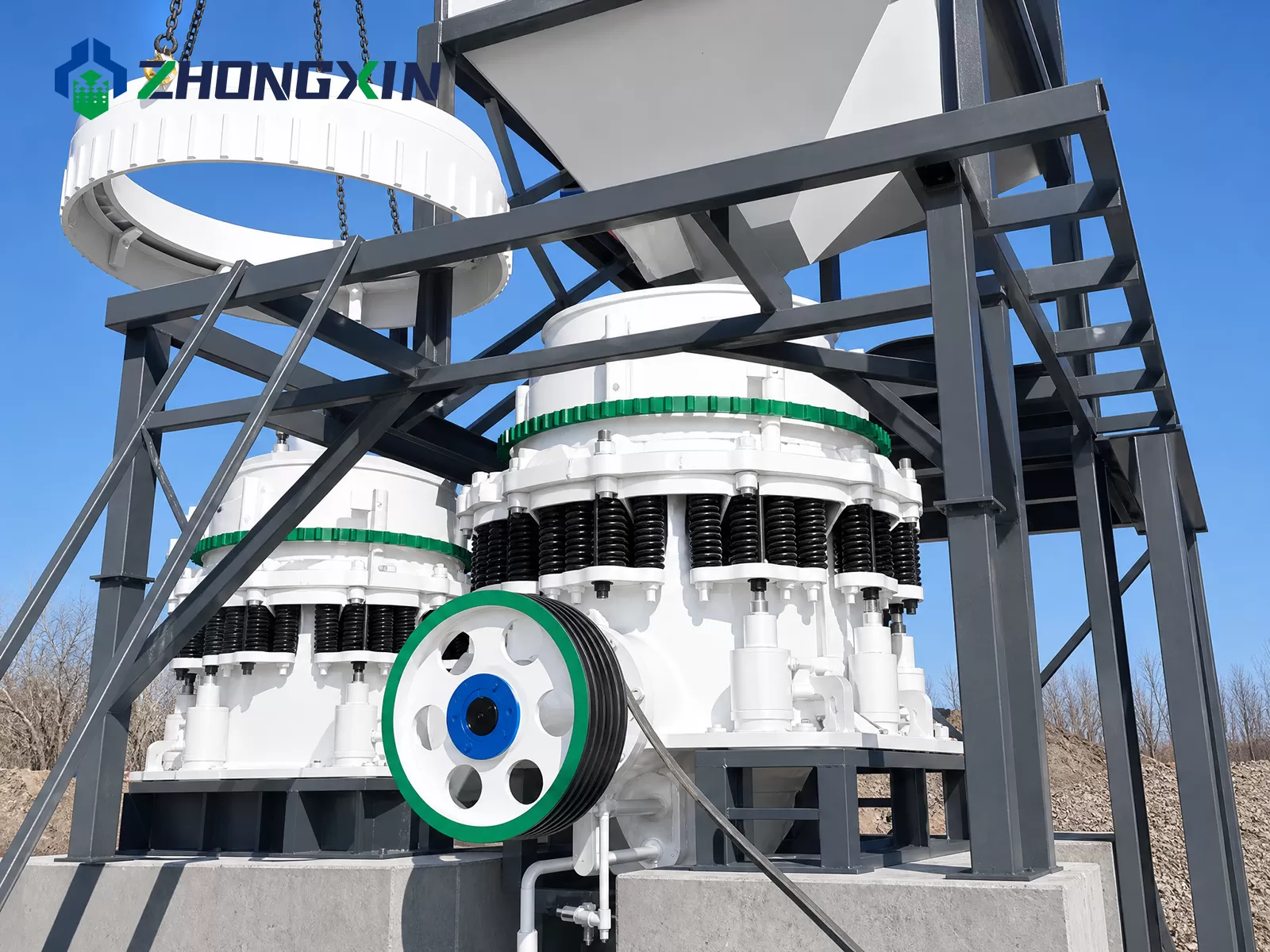 Double ZX series compound cone crushers installed on elevated steel frame in quarry