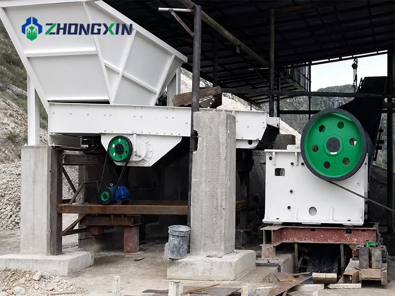 ZSW Vibrating Feeder operating in a stone crushing production line